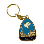 Sleutelhanger van messing met Jeruzalem en een duif erin verwerkt