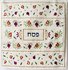 Pesach set van Yair Emanuel rijk geborduurd met granaatappeltjes bestaande uit een Matze cover en een Afikoman etui.