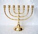 Menorah-/-Menora,-vergulde-Menorah-van-een-uitstekende-glanzende-kwaliteit-in-een-medium-maat
