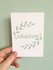 Kaart met envelop met Shalom (vrede) in gebroken wit met mintgroene letters en olijftakjes van Ahavah design